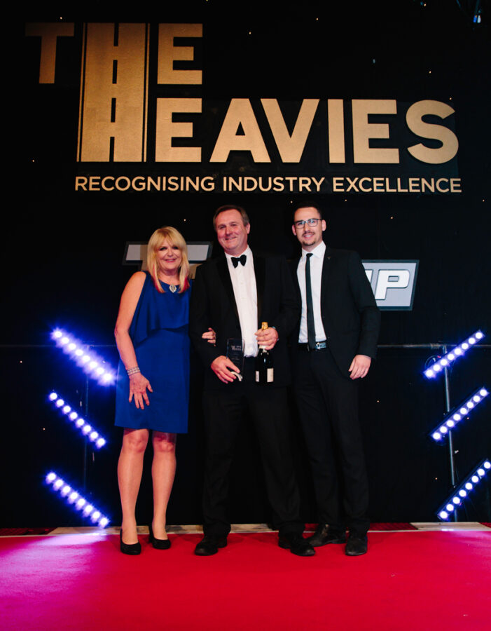 Award winners on stage beneath The Heavies branding