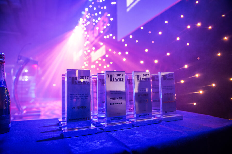 The Heavies trophies lined up under stage lights